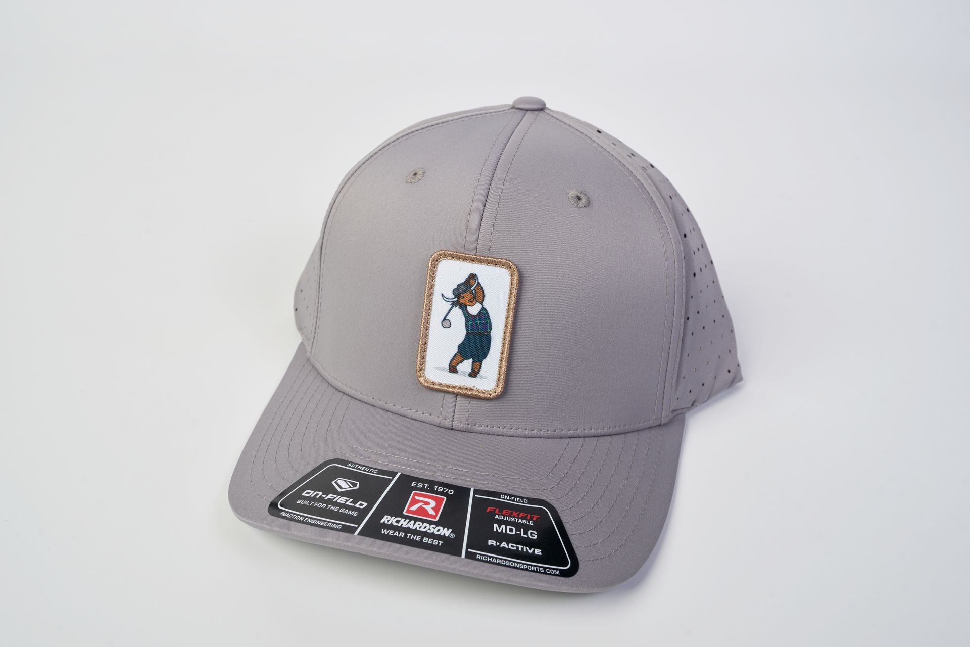 Golfer Guild Tartan Swinger Performance Cap featuring Highland Cow golfing animal design
