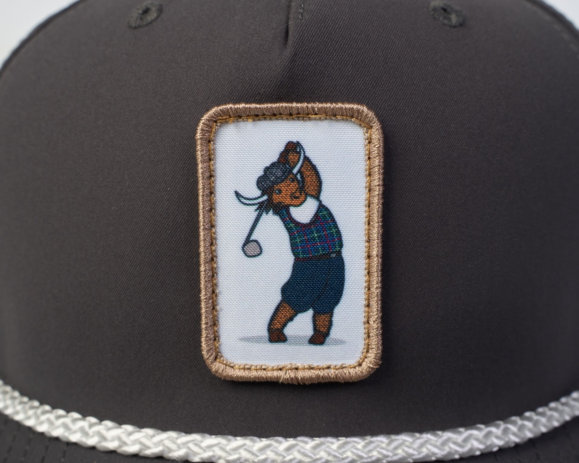 Golfer Guild Tartan Swinger Rope Hat with Scottish Highland Cow golfing art by Jonas Claesson