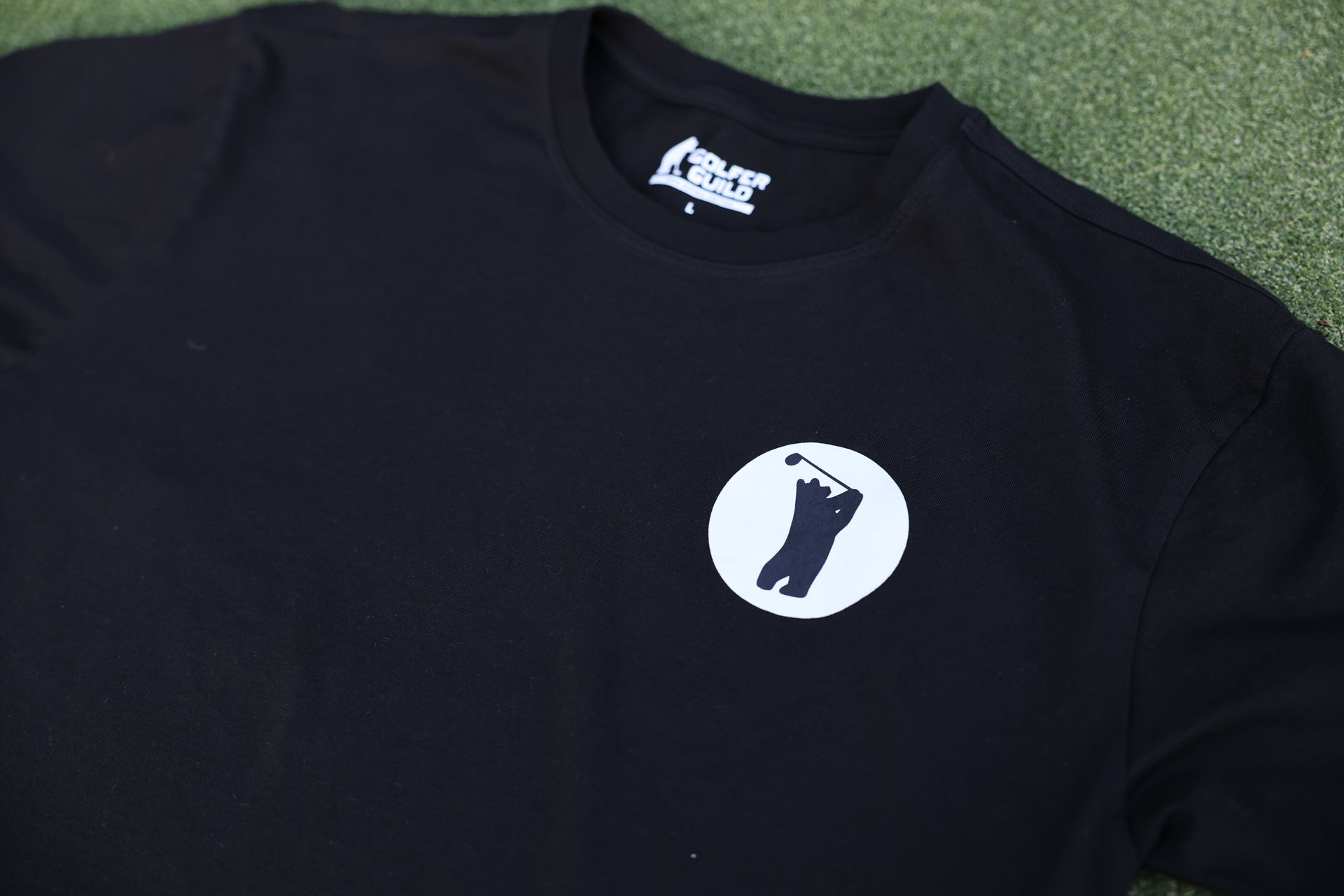 Golfer Guild SUPIMA® Bear Drive tee with golfing animal bear silhouette design by Jonas Claesson.
