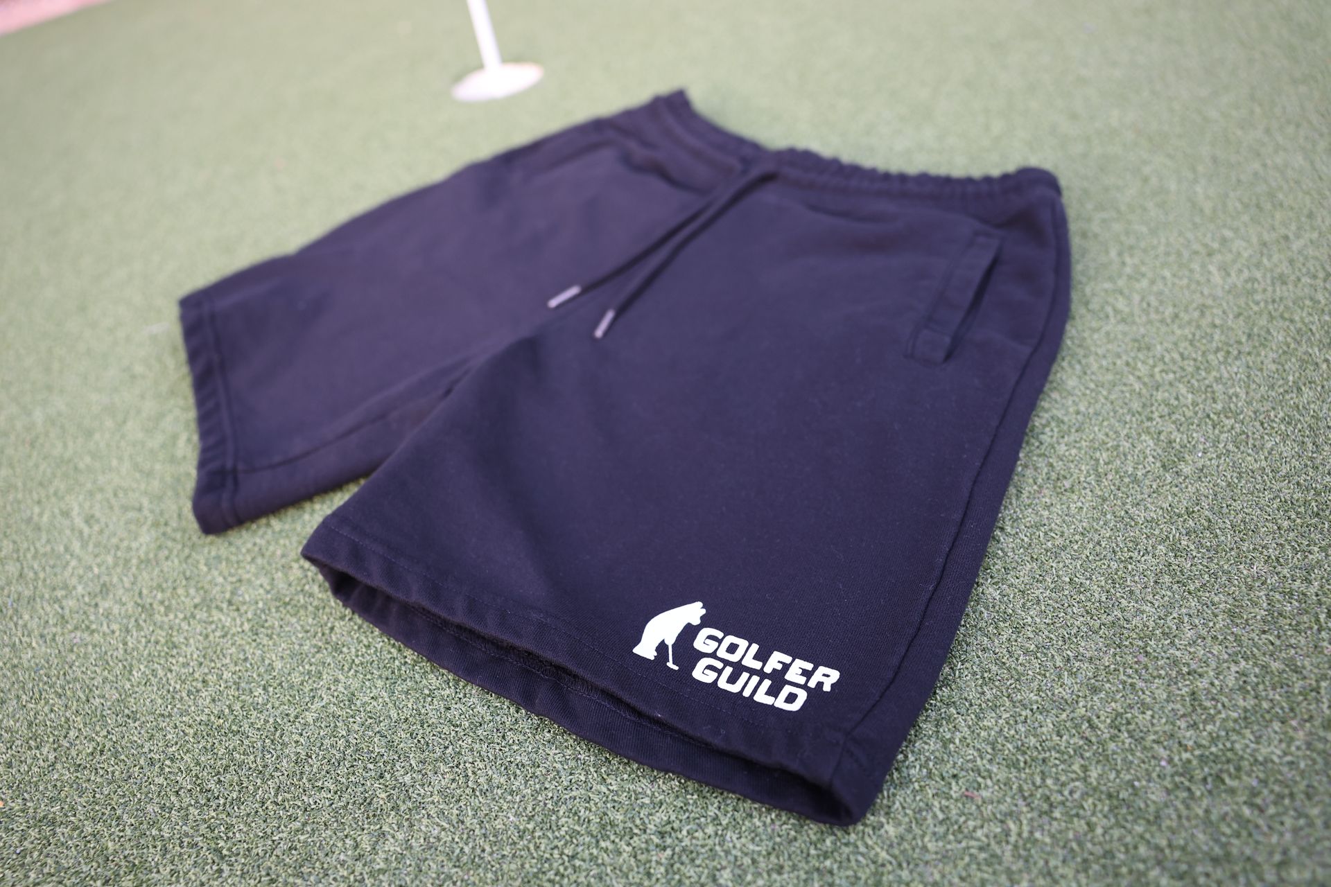 Golfer Guild Coziest Sweatshorts in organic cotton with sustainable design and golfing animal logo art by Jonas Claesson