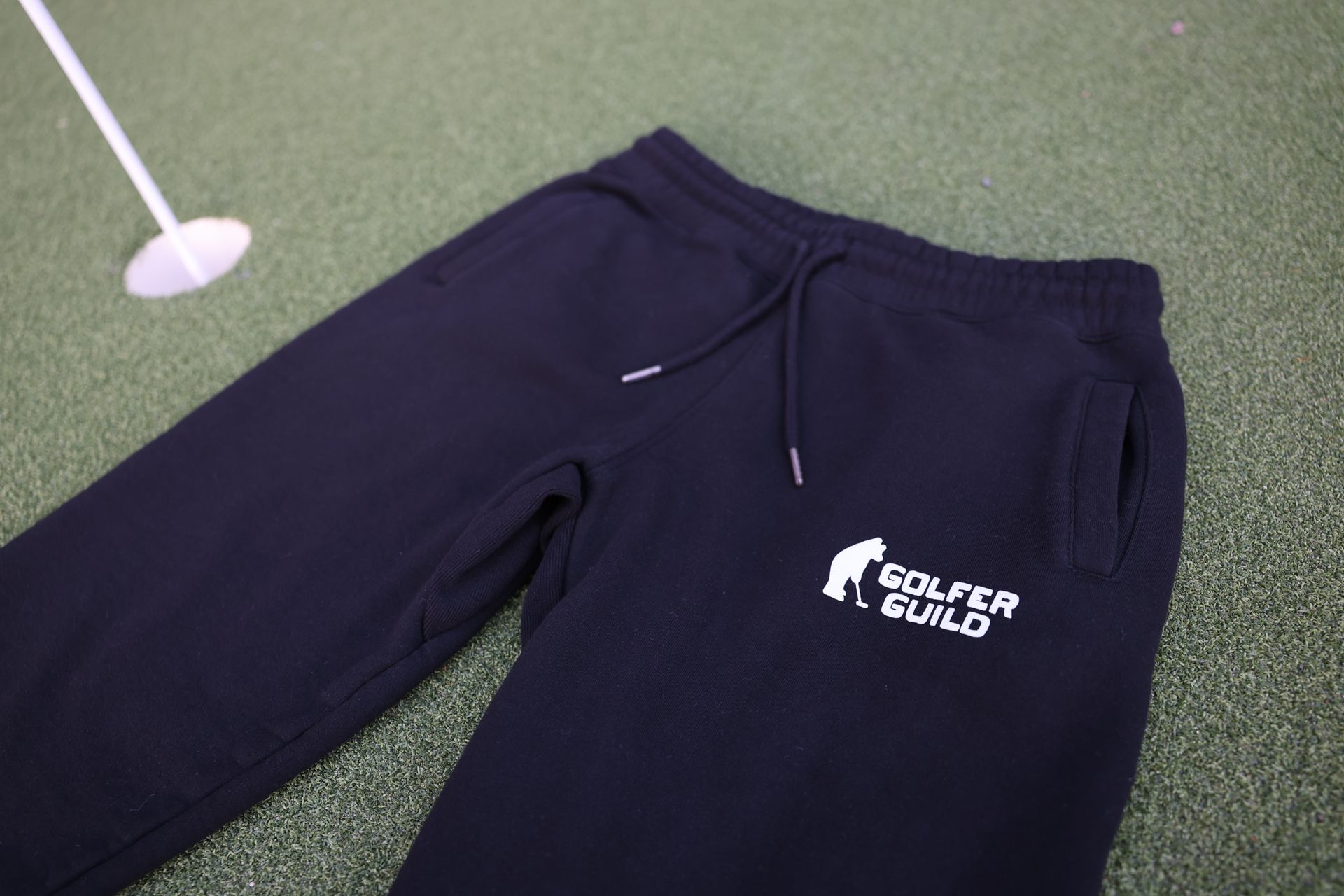 Golfer Guild Coziest Sweatpants in organic cotton with recycled fibers and golfing animal logo artwork