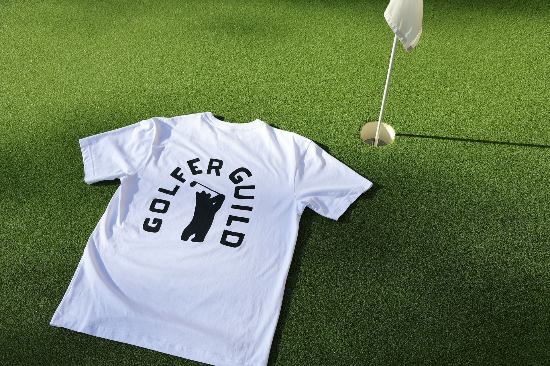 Golfer Guild SUPIMA® Bear Drive tee featuring golfing animal bear artwork by Jonas Claesson.