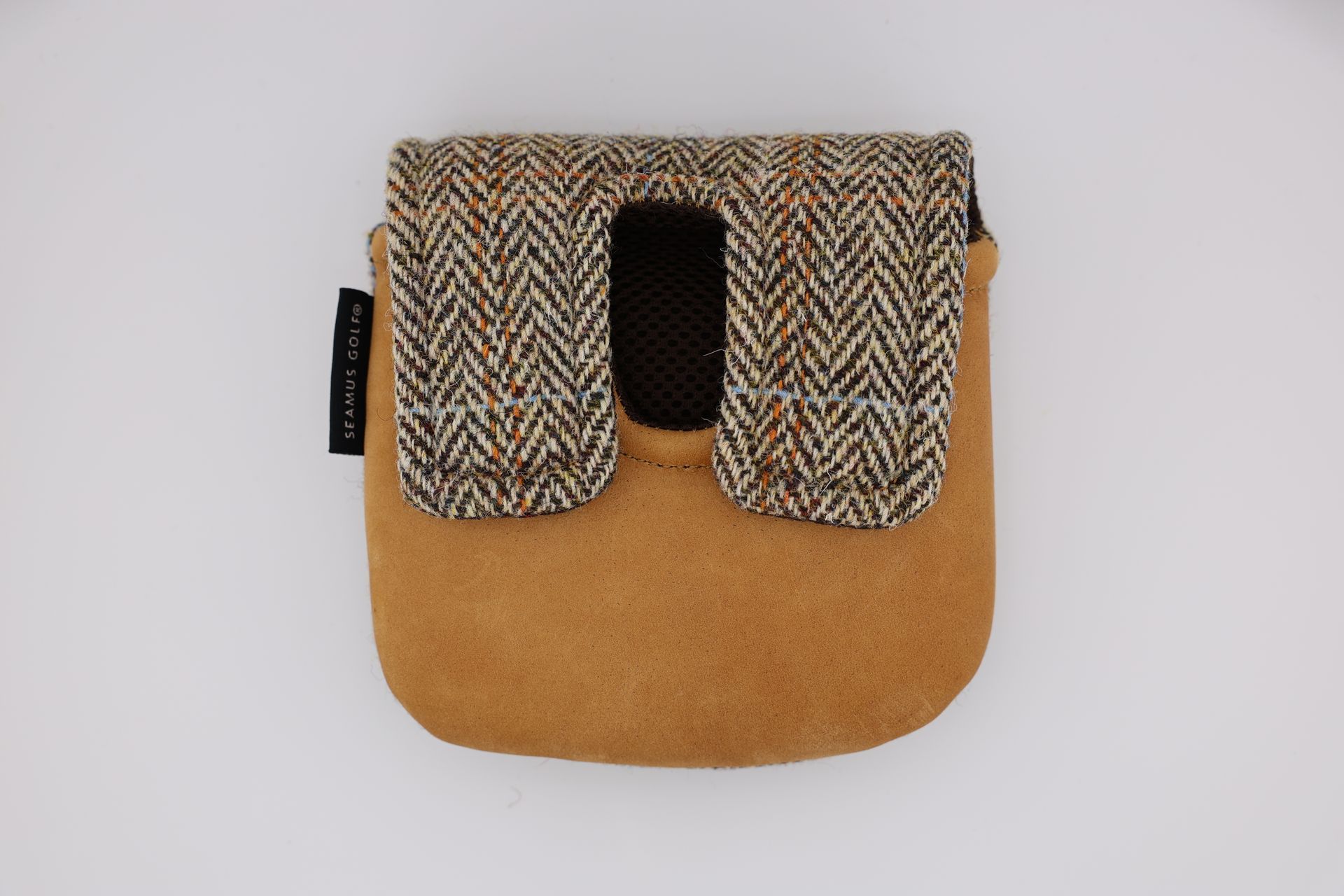 Golfer Guild Glen Plaid Harris Tweed hand-woven fabric with Jonas Claesson golfing animal art.