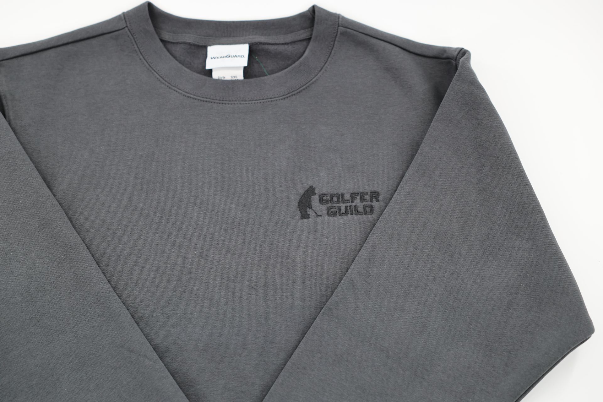 Golfer Guild Coziest Sweater featuring Jonas Claesson golfing animal artwork in soft cotton fleece