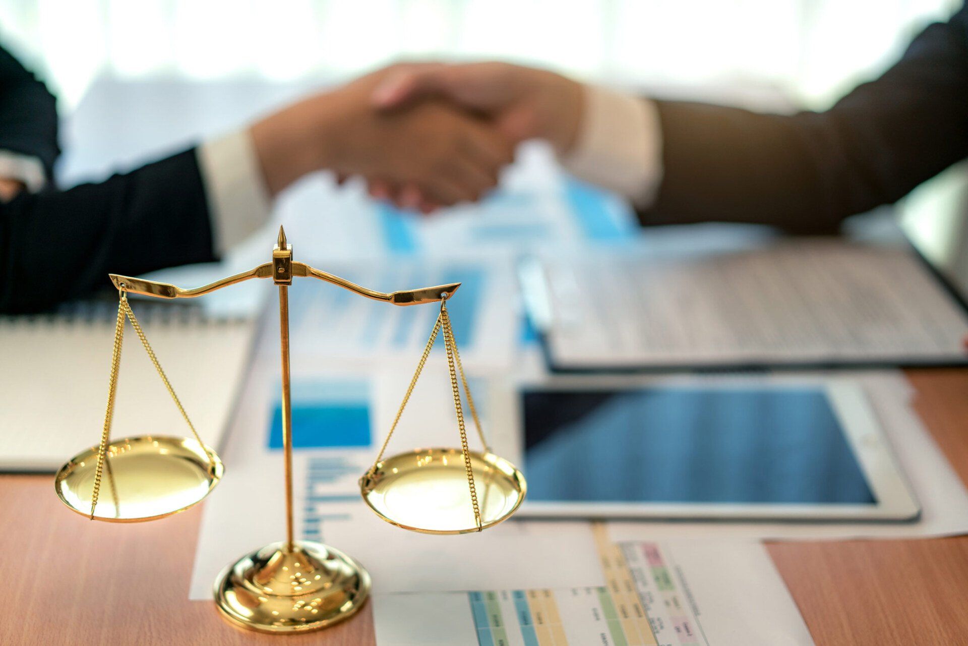 Handshake after good deal agreement | Richmond, NSW | Shaddicks Lawyers