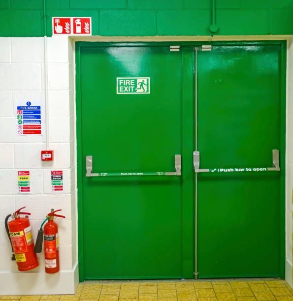 A Green Exit Sign Is On A Green Door - Bolingbrook, IL - Master Locksmithing Inc