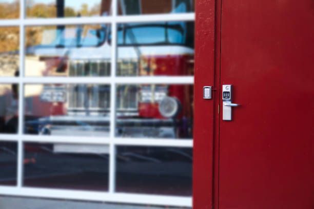 A Fire Truck Is Reflected In A Glass Garage Door - Bolingbrook, IL - Master Locksmithing Inc