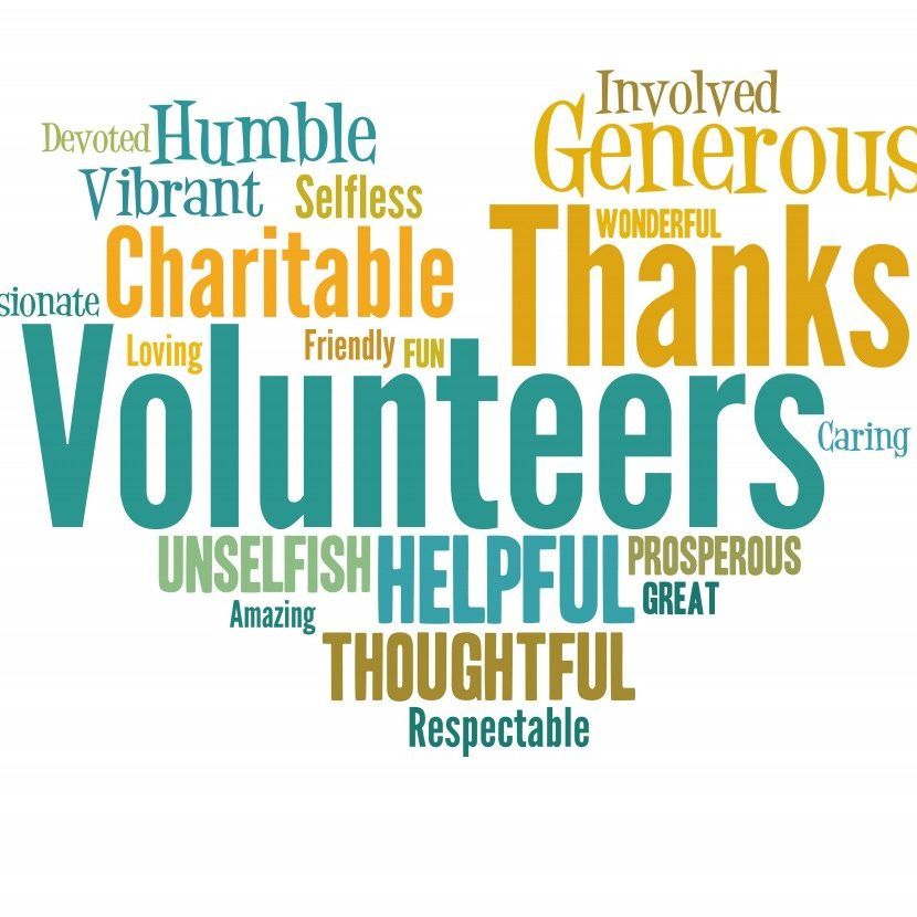 Heart-shaped word cloud of positive words describing