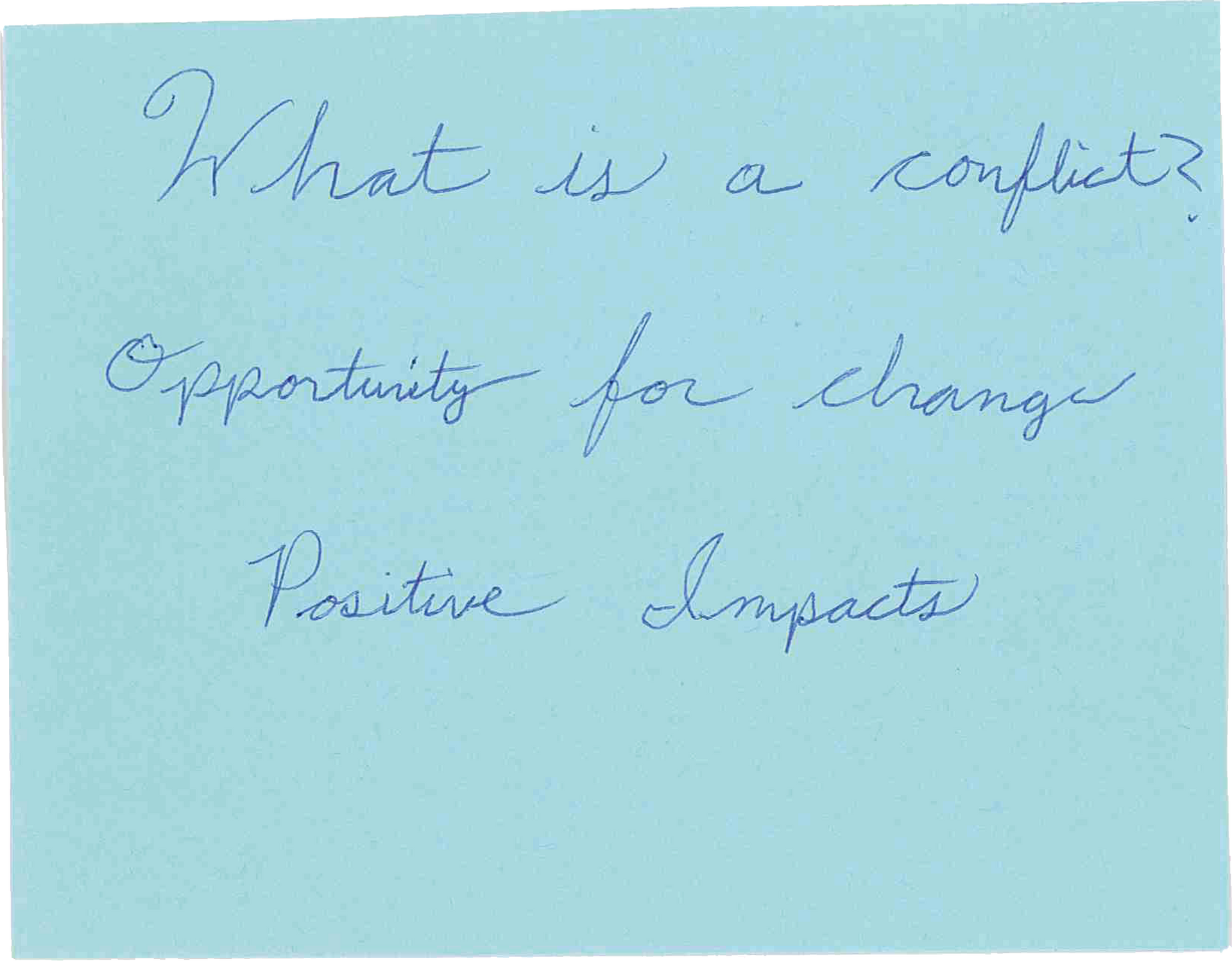 A sticky note that says what is a conflict opportunity for change positive impacts