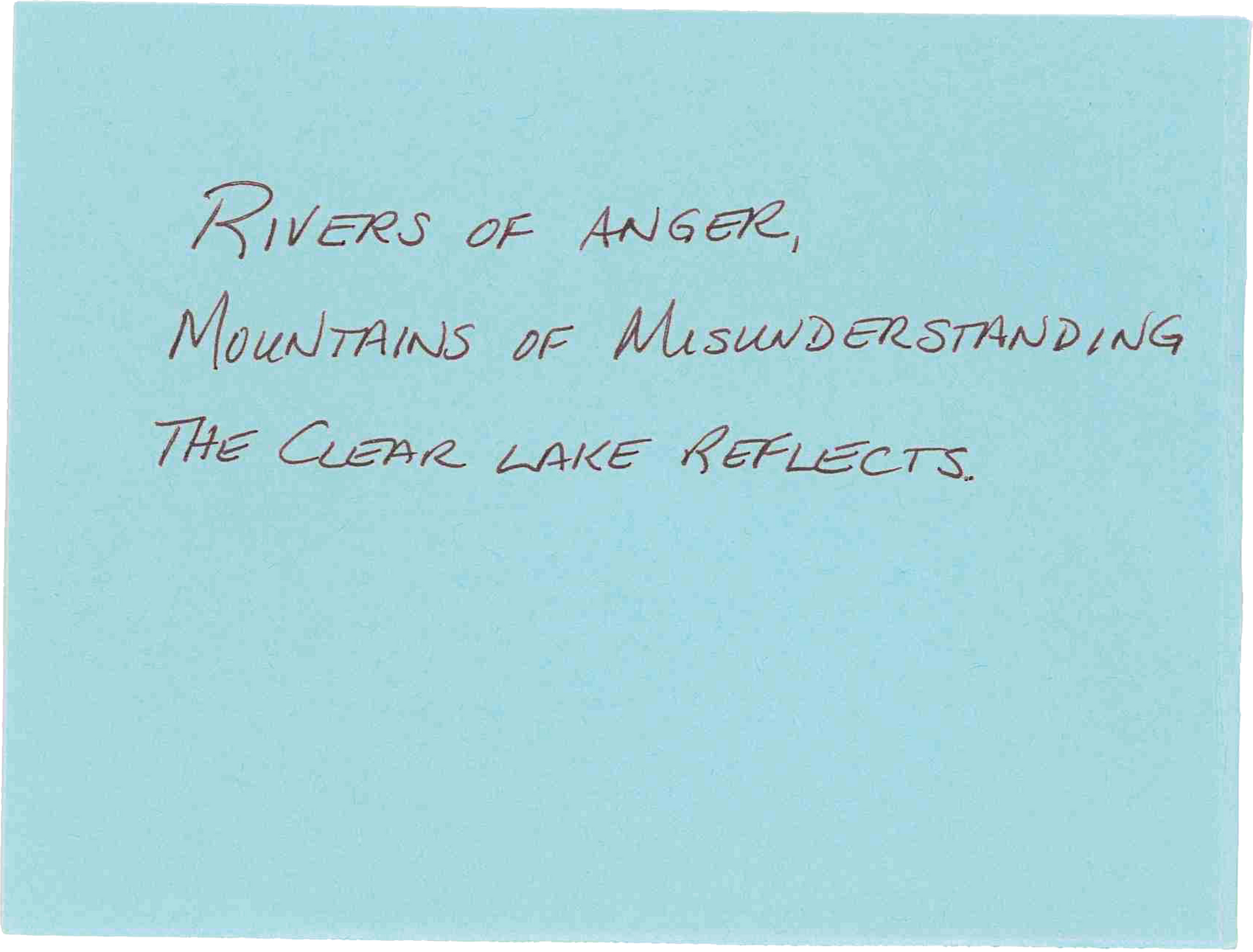 A piece of paper that says rivers of anger mountains of misunderstanding the clear lake reflects