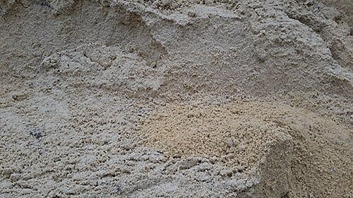 Heap of light brown sand.