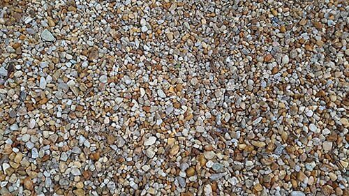 Close-up view of small, varied-colored pebbles.
