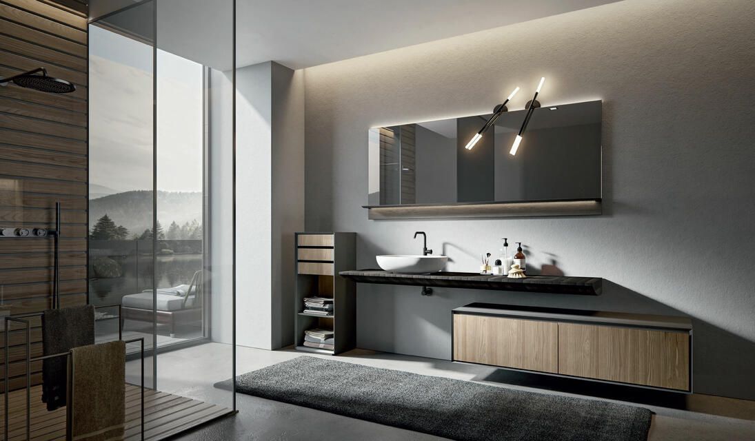 Un bagno moderno e minimalista caratterizzato da un elegante mobile lavabo, un lavabo a ciotola, uno specchio rettangolare e una vista su un paesaggio naturale.