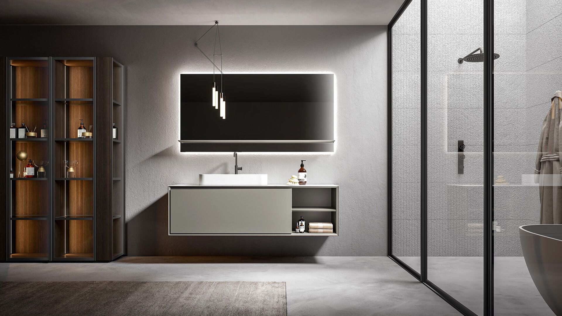 Un bagno moderno e minimalista con mobile lavabo sospeso, specchio illuminato, armadietto alto in vetro e box doccia con pareti in vetro.