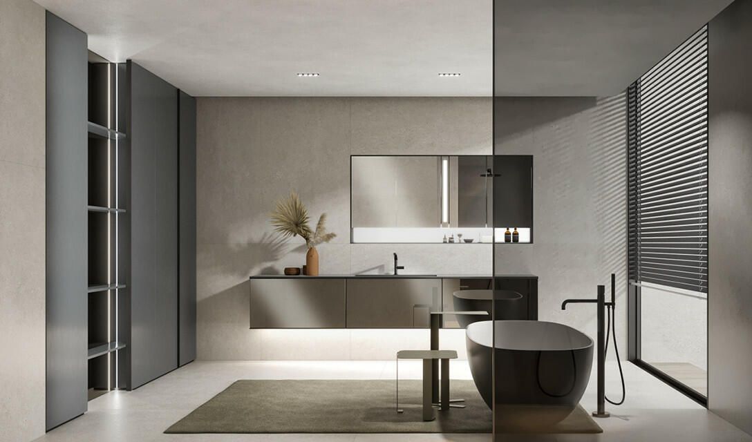 Un bagno moderno e minimalista con mobile lavabo sospeso, vasca da bagno ovale freestanding di colore scuro e un'ampia finestra con tende.