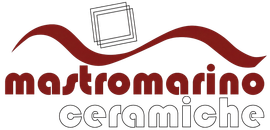 Showroom elegante di ceramiche e arredo bagno con campioni di gres, sanitari e rubinetteria.