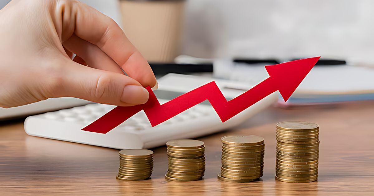 A red arrow rising over a stack of coins.