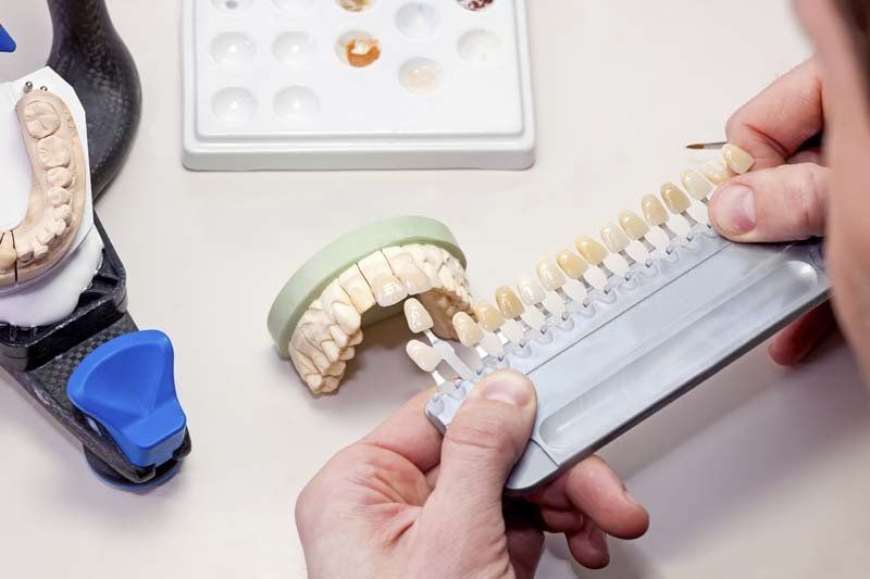 Dental technician making teeth