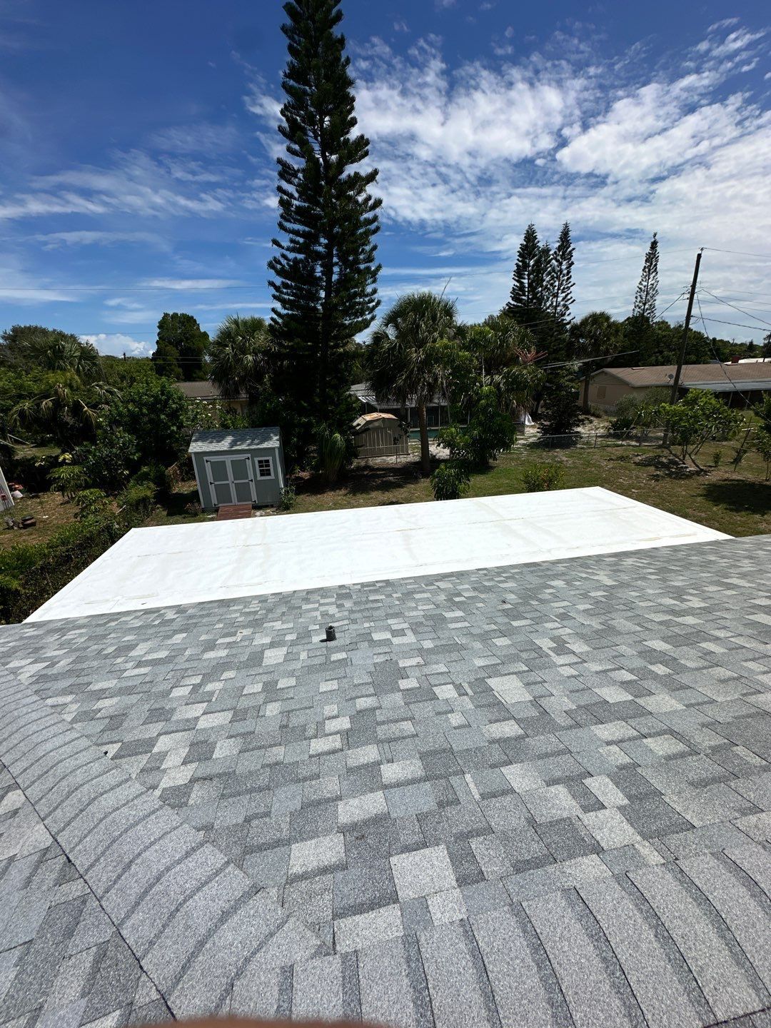 Back porch doesn't get left out, it too gets a new flat roof