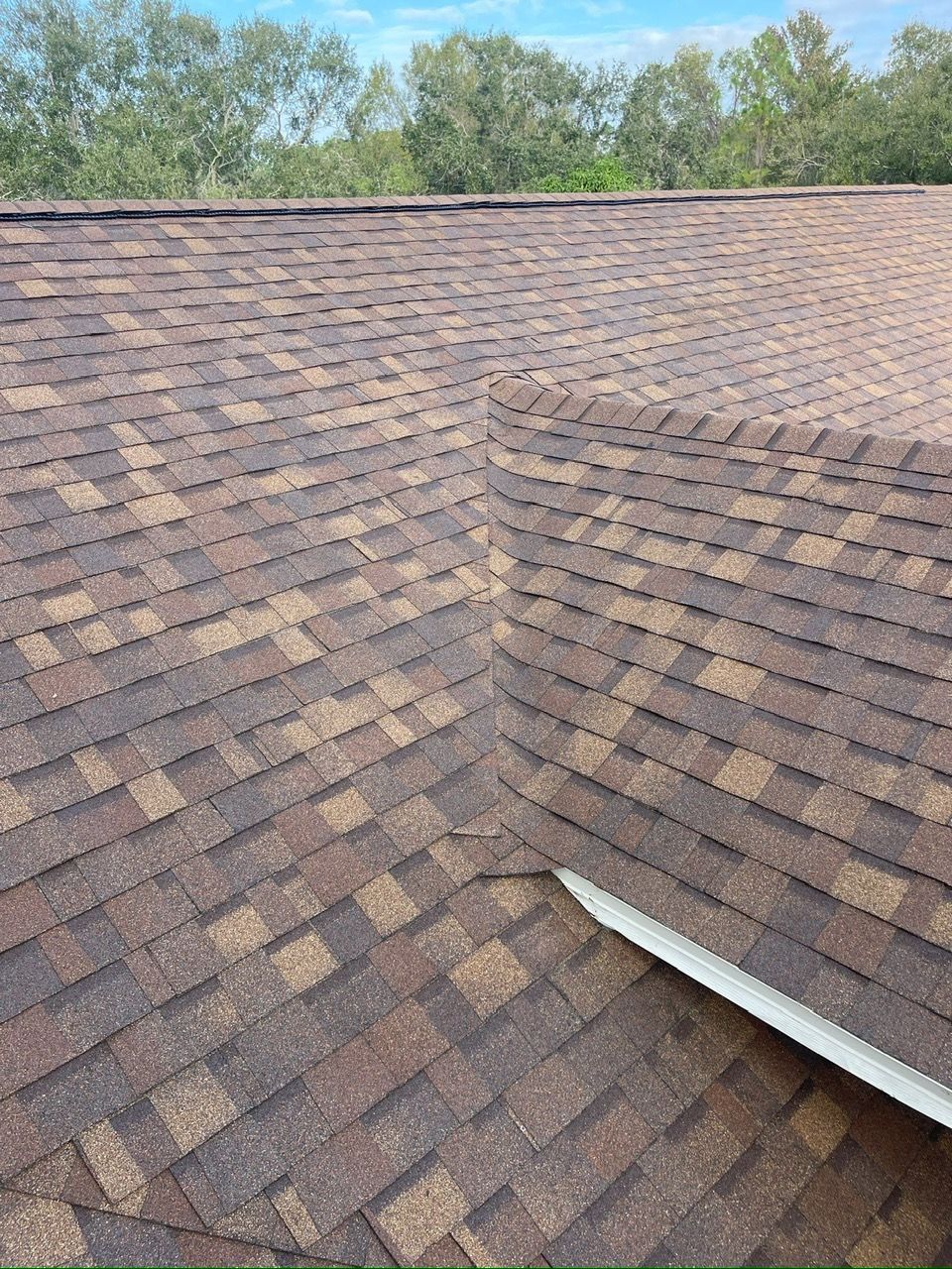 Desert Rose is a color in the brown family from Owens Corning