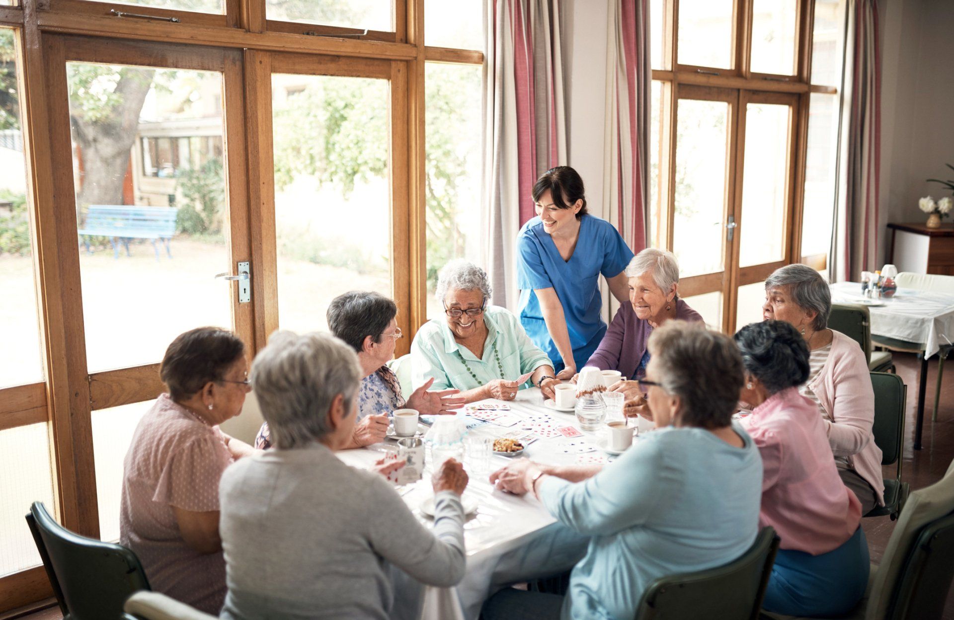 Group of Senior Women Playing Cards Together – Beaver Falls, PA – Cambridge Village