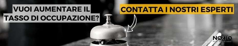 A bell on a counter with the words 