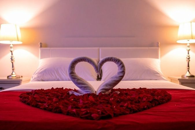 allestimento romantico camera hotel