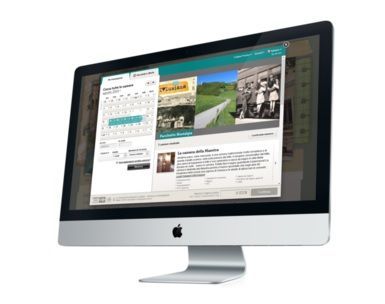 IMac che mostra una pagina web con un calendario e immagini relative a un sito storico.
