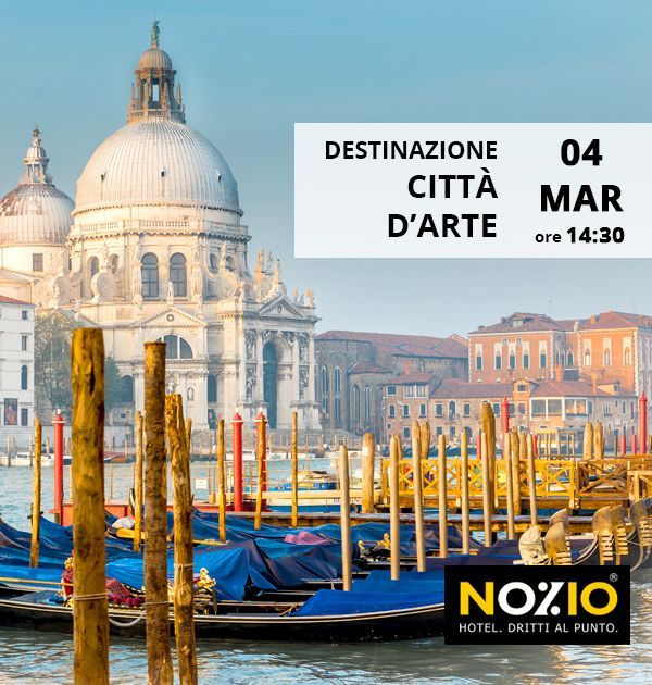 Venice, Italy: Gondolas in canal with Basilica di Santa Maria della Salute.