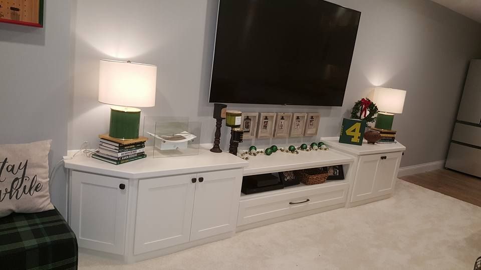 A living room filled with furniture and a flat screen tv.