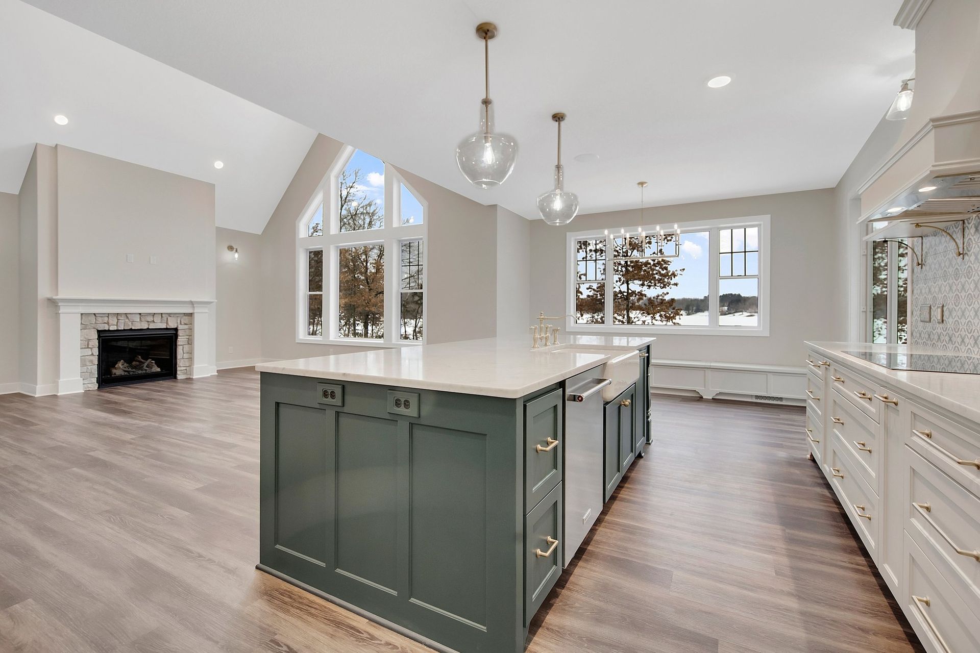 There is a large island in the middle of the kitchen.