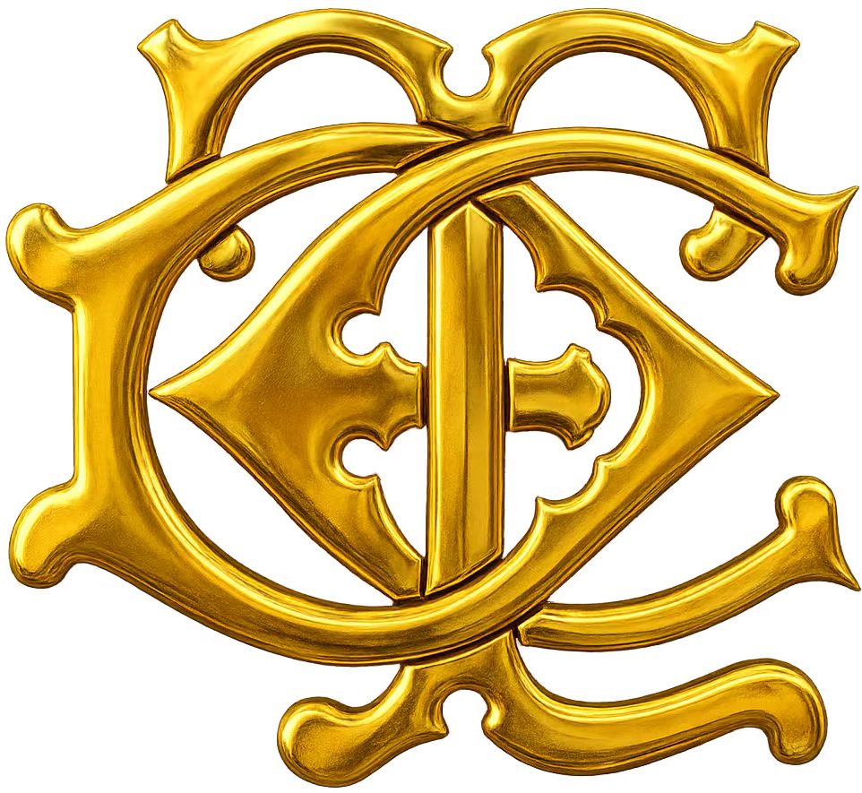 Un monograma dorado y estilizado con las letras 