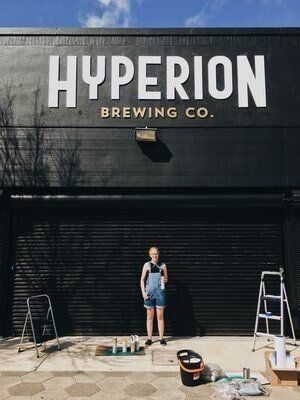 Jordan Brantley in Front of the Store — Brewing Company in Jacksonville, FL