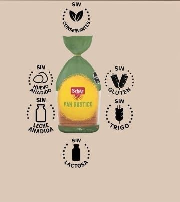 Pan rústico Schar rodeado de iconos que indican que no contiene conservantes, huevo, leche, gluten, trigo ni lactosa.
