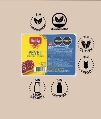 El envase del pan Schär Pevet está rodeado de iconos circulares que indican que no contiene gluten ni lactosa.