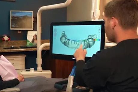 Tooth Extraction Show on Screen — Anchorage, AK — Alcan Family Dental