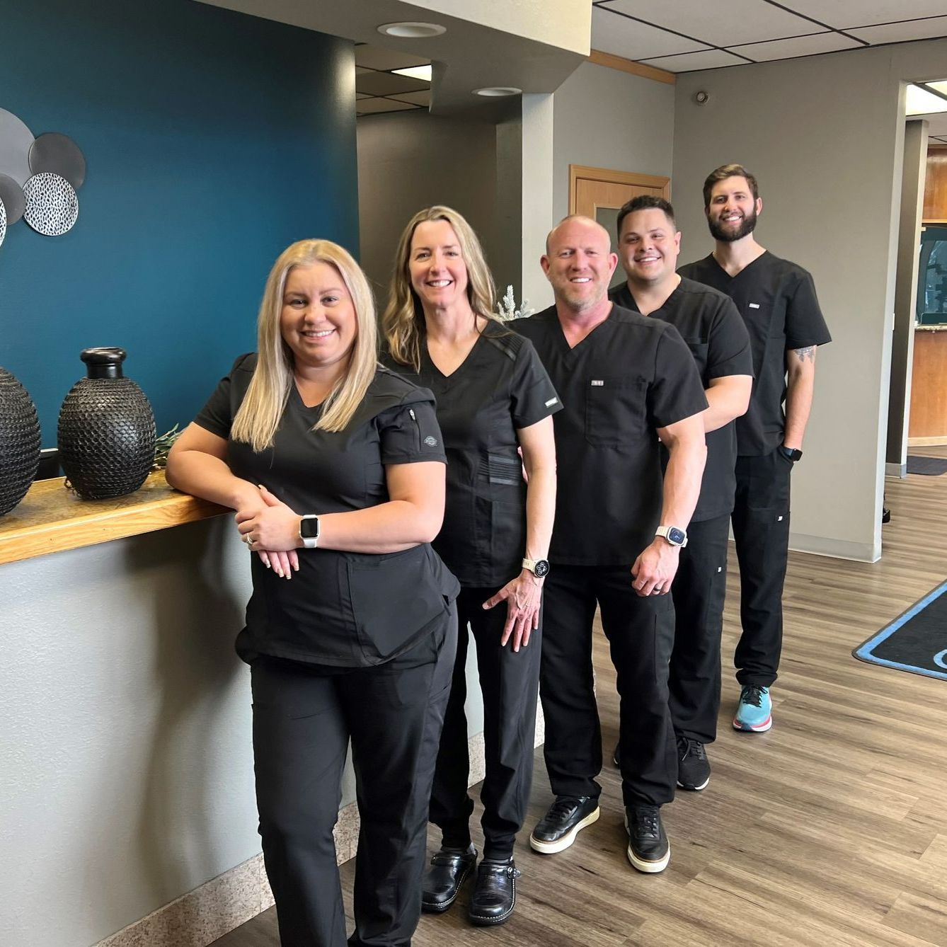 Staff and Patient Shaking Hands — Anchorage, AK — Alcan Family Dental