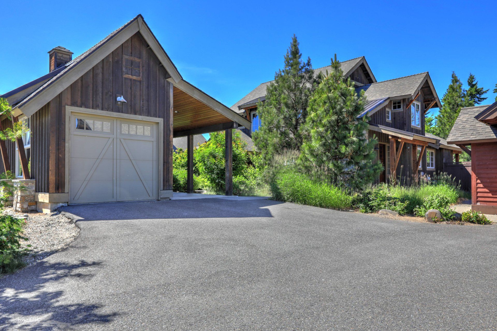 Grey Wooden Rustic House With White Garage Door — Bothell, WA — Garage Tech