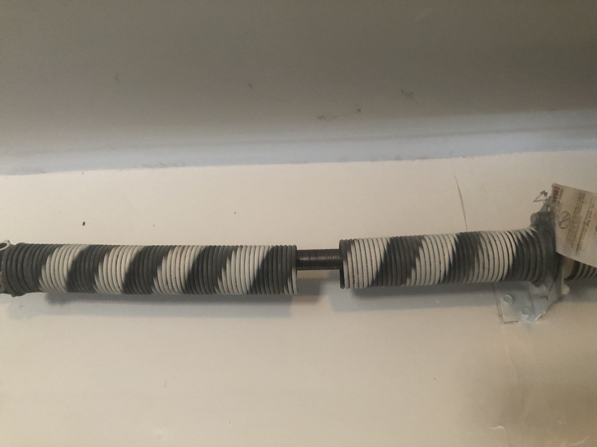 Broken Garage Door Spring — Bothell, WA — Garage Tech