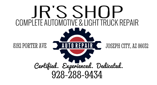 A logo for jr 's shop auto repair with a red gear and a wrench.
