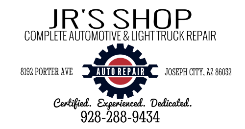 A logo for jr 's shop auto repair with a red gear and a wrench.