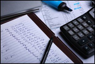  Paperwork and calculator on a desk
