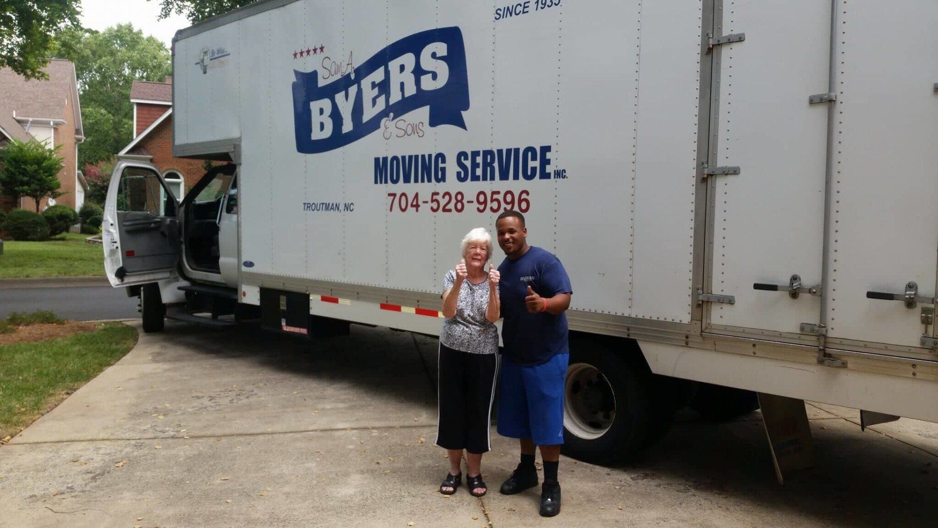 Man and Senior Woman In Front of the Bus— Storage Facility in Troutman, NC