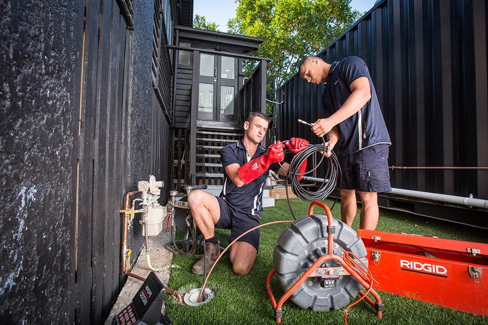 Plumbers Preparing Their Tools for Pipe Repair — Unblock Pipe Clearing in the Mullumbimby, NSW