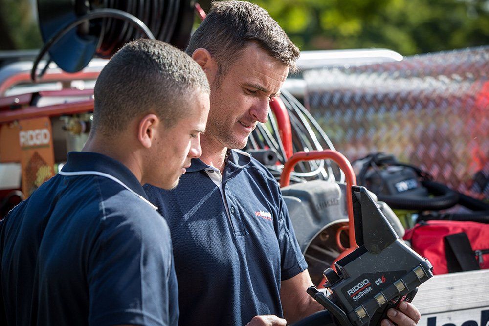 Plumbers Performing a CCTV Pipe Inspection — Unblock Pipe Clearing in Mullumbimby, NSW