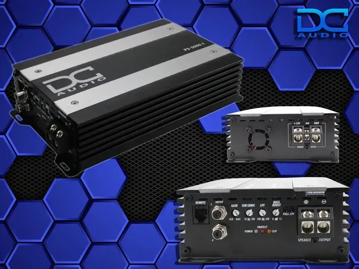 A black and white amplifier with the word dc on it