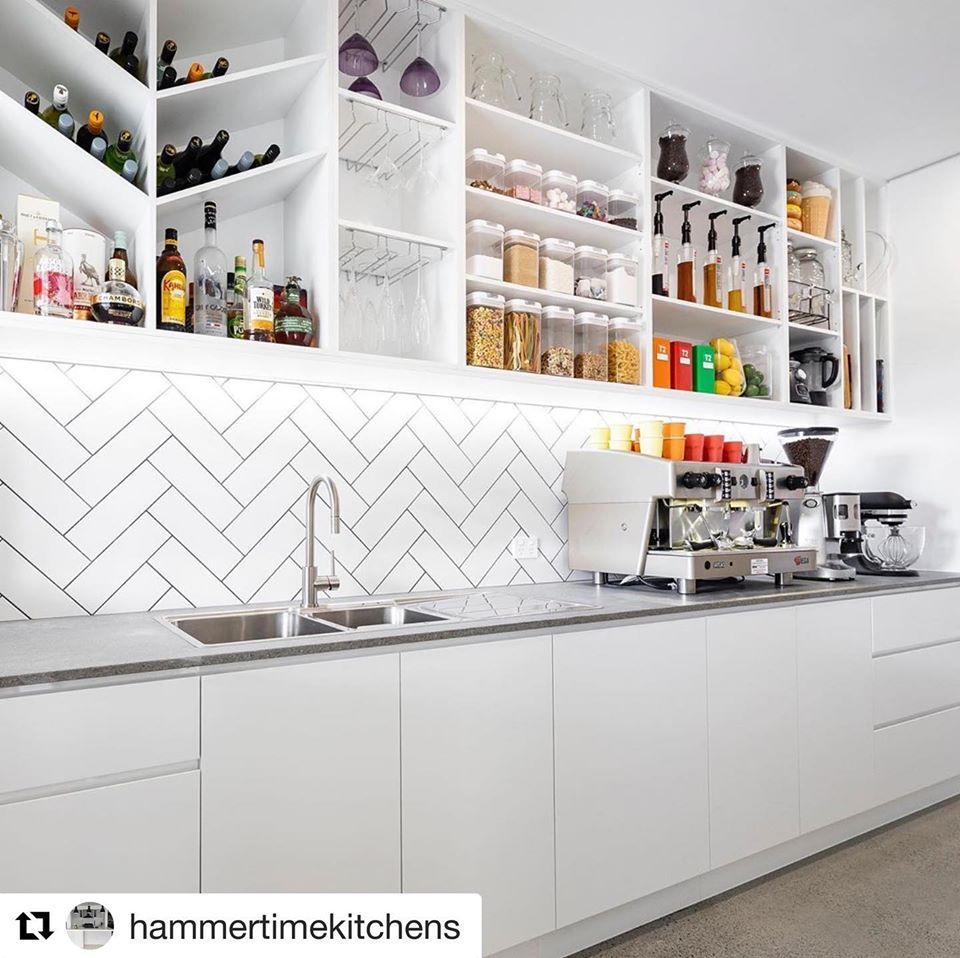 A Kitchen With White Cabinets — Southeast Stone Pty Ltd In Caloundra West, QLD