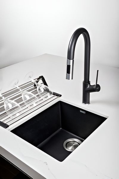 A Black Sink With a Black Faucet on a White Counter  — Southeast Stone Pty Ltd In Caloundra West, QLD