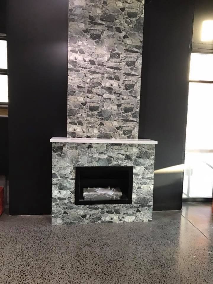 There Is A Fireplace In The Middle Of The Room  — Southeast Stone Pty Ltd In Caloundra West, QLD
