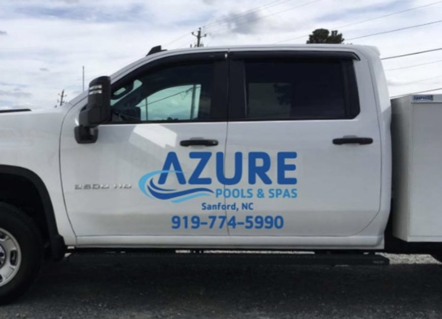 Man Cleaning The Pool — Sandford, NC — Azure Pools & Spas
